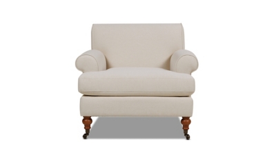 front view beige armchair with chaise-style leg extension
