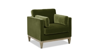 front view of green velvet armchair with cushions and exposed wooden legs