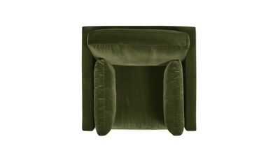 green velvet armchair with armless side cushions; isolated on white