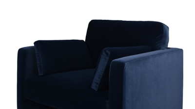 navy blue armchair with wooden legs in close-up
