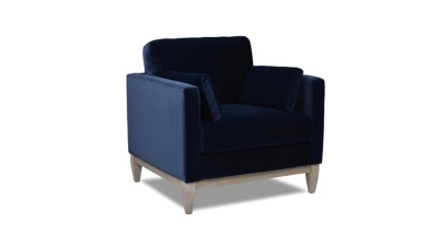 navy blue armchair isolated on white background with wooden legs