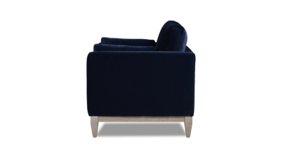 navy blue armchair with white background