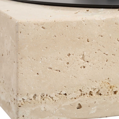 Close-up of beige stone texture with porous surface and minor holes.