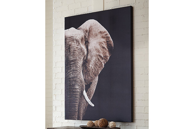 The elephant is a symbol of so many things: power, prosperity, wisdom, fertility, good luck—and, of course, safeguarding the home. Whatever you believe, you can’t deny the high-style appeal of this elegantly done elephant wall art that blends shades of black, white and gray for dramatic effect.Unframed gallery wrapped canvas | Black, white and gray palette | D-ring bracket hanger | For vertical hanging