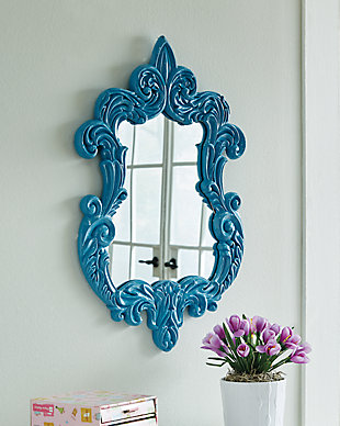Not afraid to stand out from the crowd? Good. Wowing with an elaborately scrolled frame in brilliant blue, the Diza accent mirror reflects your personal flair beautifully.Mirrored glass with polyresin frame | D-ring bracket hanger | Clean with a soft, dry cloth
