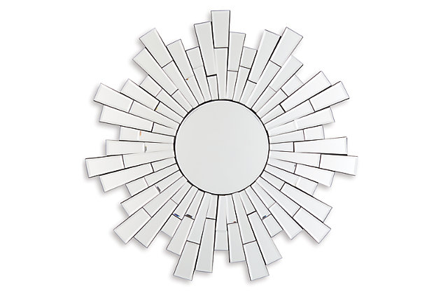 Need a burst of light for a dark interior? Radiant light is delivered from the sunburst design of the Braylon accent mirror. Framed in a mosaic spray of cut glass tiles, the circular beveled mirror will beautifully brighten up any wall space.Cut glass frame | Circular beveled mirror | Keyhole bracket hanger | Clean with a soft, dry cloth