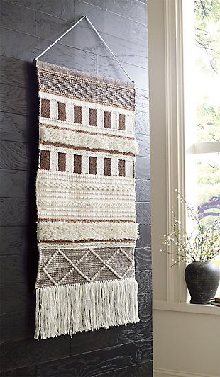 Dream weaver. What else would you call this wonderfully textural tapestry in soothing neutral tones? Channeling the spirit of boho-chic design, this wall hanging will add interest to your wall-scape, inside or out.Made of polyester | Shades of brown and natural | Indoor/outdoor safe | Braided cord for hanging