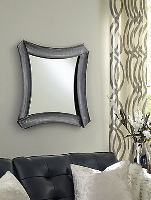 The delightful diamond shape of the Posie accent mirror works as well for contemporary decor as it does for traditional. The antique silvertone finish of the ribbon style frame provides perfectly neutral charm for any interior.Made of metal | Mirrored glass | Antiqued silvertone finish | Keyhole bracket | Ready for hanging