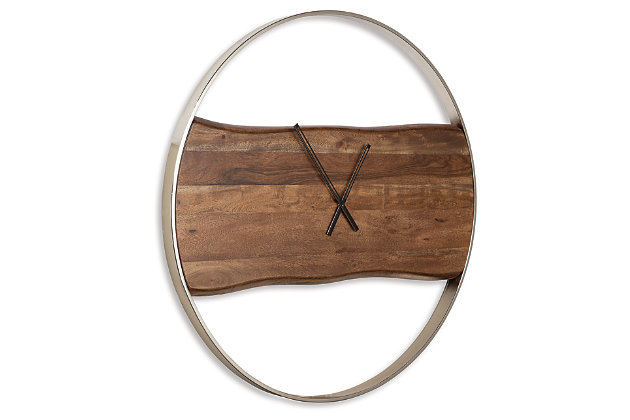 Time to simplify? The Panchali round streamlined wall clock is a mastery in minimalism. Striking brown finished wood with silvertone finished frame and hands proves that less really is more—just two simple hands floating on a wooden plank. The ultimate designer piece for lovers of casual style.Wood and metal | Faux live-edge design | Keyhole hanger | Horizontal hanging only