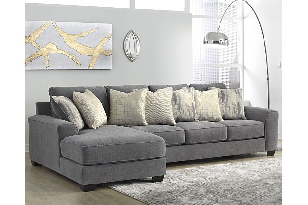 Life may be full of sacrifices, but with the Castano sectional in jewel gray, you compromise nothing to get everything you could ask for. Crisp, clean, contemporary style, pillowy softness and exceptional craftsmanship are yours for the taking at a price that’s surprisingly affordable for such a generously scaled, quality offering. Designed for looks and longevity, this sectional includes our exclusive platform foundation system made to resist sagging and maintain a tight, wrinkle-free aesthetic.Includes 2 pieces: left-arm facing corner chaise and right-arm facing sofa | Corner-blocked frame | Loose back and seat cushions | 7 toss pillows included | Pillows with soft polyfill | Polyester/linen upholstery | Polyester; polyester/linen; polyester/cotton/rayon; polyester/cotton pillows | Platform foundation system resists sagging 3x better than spring system after 20,000 testing cycles by providing more even support | Smooth platform foundation maintains tight, wrinkle-free look without dips or sags that can occur over time with sinuous spring foundations | Exposed feet with faux wood finish | Estimated Assembly Time: 5 Minutes
