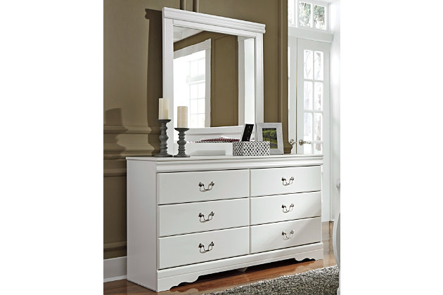 The Anarasia dresser and mirror set's crisp cottage white gives traditional Louis Philippe profiling a delightful style awakening. The look is timeless. The feel? Right at home. Six smooth-gliding drawers with antiqued bail pulls beautifully accommodate.Made of engineered wood (MDF/particleboard) | 6 smooth-gliding drawers | Antiqued pewter-tone hardware | Mirror attaches to back of dresser | Assembly required | Includes tipover restraint device | Estimated Assembly Time: 5 Minutes