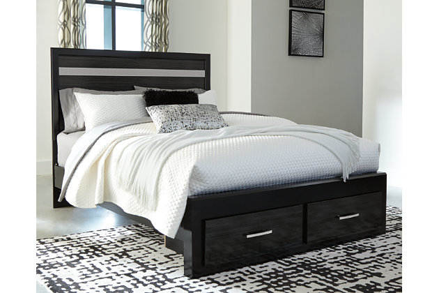 Starry, starry nights. Inspired by Hollywood glam, the richly styled Starberry queen storage bed steals the show in a simply stunning way. The bed’s replicated walnut grain is enriched with a high-gloss black finish, made even more dramatic with a strip of sleek silver glitter banding that accentuates a clean-lined, contemporary aesthetic. Mattress available, sold separately.Includes headboard, footboard with storage, platform rails and slats | Made of engineered wood (MDF/particleboard) and decorative laminate | High gloss black finish with replicated straight silver walnut grain framed in black finish | Silvertone glitter accent | 2 smooth-gliding drawers | Chrome-tone hardware with faux crystals | Bed does not require a foundation/box spring | Mattress available, sold separately | Assembly required | Estimated Assembly Time: 15 Minutes