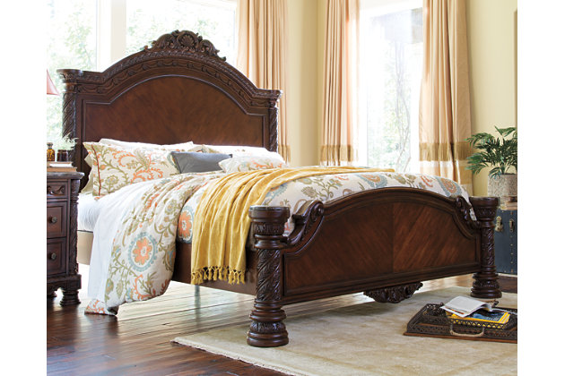 Inspired by the grandeur and grace of Old World traditional style, the North Shore king panel bed is nothing short of stunning. A choice blend of materials is accented by detailed ornamental appliques. Large-scale decorative pilasters make a grand stance. Mattress and foundation/box spring sold separately.Made of veneers, wood, engineered wood, cast resin and marble parquetry | Includes headboard, footboard and rails | Footboard with marble parquetry panel caps | Assembly required | Foundation/box spring required, sold separately | Mattress available, sold separately | Estimated Assembly Time: 25 Minutes