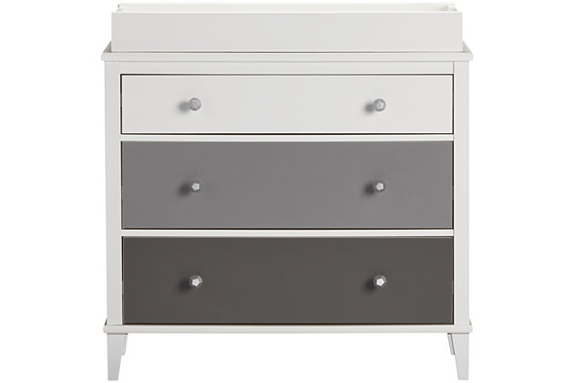 Let them outgrow their clothes, not their furniture. Offering a sweet yet sophisticated look inspired by cottage design, the quality-built Monarch Hill Poppy 3-drawer dresser has a sense of staying power you’re sure to love. Just remove the changing table top to convert it to a dresser. It’s a chic choice whether it’s in the nursery, or a teen’s room.Includes 3-drawer dresser and changing table | Made of engineered wood/laminated particle board | Non-toxic, three-tone (white, light gray and dark gray) finish | 3 smooth-gliding drawers | Changing table topper fits most standard size changing pads (sold separately) | Changing table topper fits most standard size changing pads (sold separately) | Anti-tip kit included for extra protection | 1-year warranty | Assembly required | Ships in 2 boxes