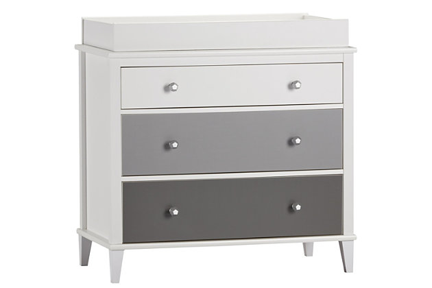 Let them outgrow their clothes, not their furniture. Offering a sweet yet sophisticated look inspired by cottage design, the quality-built Monarch Hill Poppy 3-drawer dresser has a sense of staying power you’re sure to love. Just remove the changing table top to convert it to a dresser. It’s a chic choice whether it’s in the nursery, or a teen’s room.Includes 3-drawer dresser and changing table | Made of engineered wood/laminated particle board | Non-toxic, three-tone (white, light gray and dark gray) finish | 3 smooth-gliding drawers | Changing table topper fits most standard size changing pads (sold separately) | Changing table topper fits most standard size changing pads (sold separately) | Anti-tip kit included for extra protection | 1-year warranty | Assembly required | Ships in 2 boxes