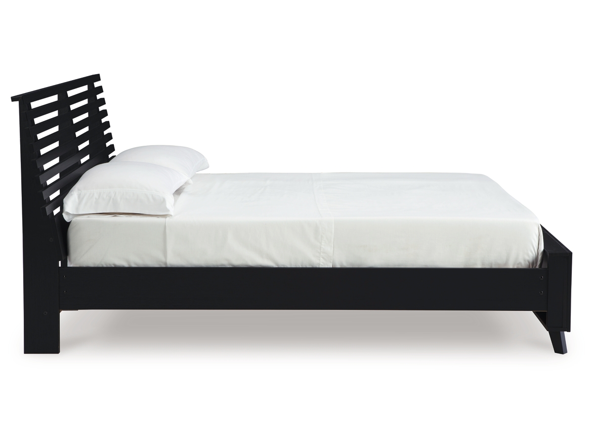 Danziar Queen Slat Panel Bed with Framed Panel Footboard