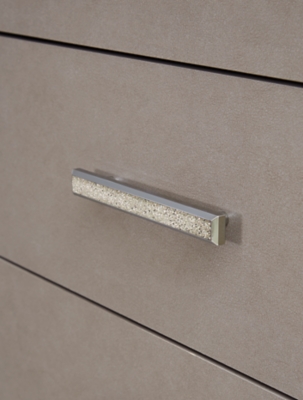 close-up of drawer handle on chest