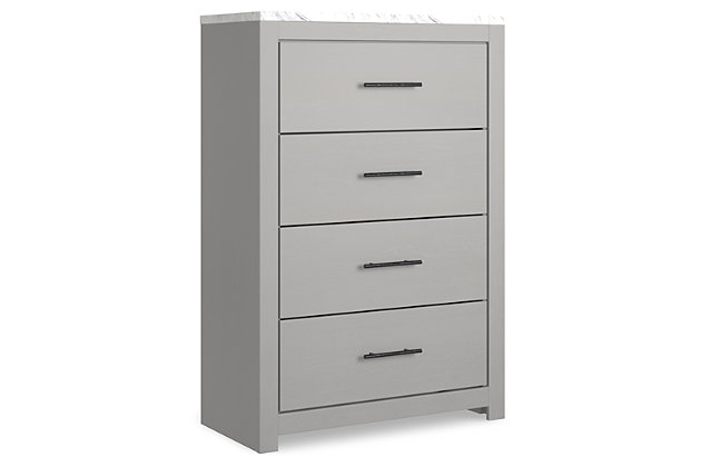 Cool, clean and casually modern. The Cottonburg chest’s wispy dove gray finish and faux Calcutta marble top set the tone for your calming sanctuary. Large linear pulls add dimension and authenticity. Four smooth-gliding drawers neatly accommodate your wardrobe needs.Made of engineered wood (MDF/particleboard) | and decorative laminate | Wispy dove gray finish with replicated wood grain | Replicated Calcutta marble top | 4 smooth-gliding drawers with faux linen lining | Large scale dark colored handles | Safety is a top priority, clothing storage units are designed to meet the most current standard for stability, ASTM F 2057 (ASTM International) | Drawers extend out to accommodate maximum access to drawer interior while maintaining safety | Assembly required