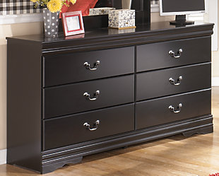 The Huey Vineyard dresser is the epitome of traditional decor. Louis Philippe-style moulding dates back to the mid-19th century when furnishings were lavish yet somewhat simple. Luxe finish adds a slightly modern touch. Six smooth-glide drawers beautifully accommodate your wardrobe.Dresser only | Made of engineered wood | Antiqued pewter-tone hardware | 6 smooth-operating drawers | Louis Philippe-style moulding | Includes tipover restraint device | Safety is a top priority, clothing storage units are designed to meet the most current standard for stability, ASTM F 2057 (ASTM International) | Drawers extend out to accommodate maximum access to drawer interior while maintaining safety