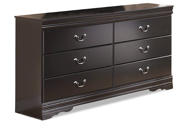 The Huey Vineyard dresser is the epitome of traditional decor. Louis Philippe-style moulding dates back to the mid-19th century when furnishings were lavish yet somewhat simple. Luxe finish adds a slightly modern touch. Six smooth-glide drawers beautifully accommodate your wardrobe.Dresser only | Made of engineered wood (MDF/particleboard) | Antiqued pewter-tone hardware | 6 smooth-operating drawers | Louis Philippe-style moulding | Includes tipover restraint device | Safety is a top priority, clothing storage units are designed to meet the most current standard for stability, ASTM F 2057 (ASTM International) | Drawers extend out to accommodate maximum access to drawer interior while maintaining safety
