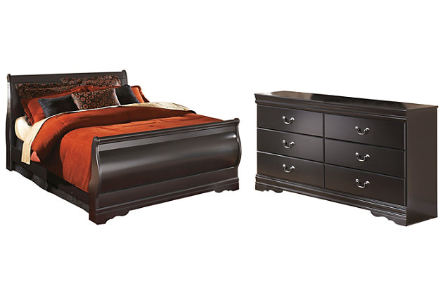 The Huey Vineyard bedroom set with sleigh bed and dresser is the epitome of traditional decor. Louis Philippe-style moulding dates back to the mid-19th century when furnishings were lavish yet somewhat simple. Luxe finish adds a slightly modern touch. Smooth-glide drawers beautifully accommodate your wardrobe.Includes bed (with headboard, footboard and rails) and dresser (mirror not included) | Made of engineered wood (MDF/particleboard)  | Glossy finish over replicated cherry grain | Antiqued pewter-tone hardware | Dresser with 6 smooth-gliding drawers | Assembly required | Foundation/box spring required, sold separately | Mattress available, sold separately | Estimated Assembly Time: 10 Minutes