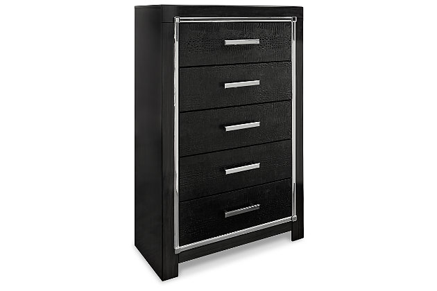 Rest easy. The luxurious look you’ve been dreaming of is yours for the taking, at a price sure to put you at ease. The Kaydell chest of drawers’ deep, dark finish, faceted chrome-tone accents and faux alligator panels exude Hollywood-chic style to the max. Sure to entice those with refined tastes, this chest is a contemporary masterpiece.Made of engineered wood (MDF/particleboard) and decorative laminate | Replicated walnut wood grain | Textured faux alligator panels | Chrome-tone faceted accents | 5 smooth-gliding drawers with faux linen lining and large chrome-tone pulls with faceted details | Safety is a top priority, clothing storage units are designed to meet the most current standard for stability, ASTM F 2057 (ASTM International) | Drawers extend out to accommodate maximum access to drawer interior while maintaining safety | Assembly required