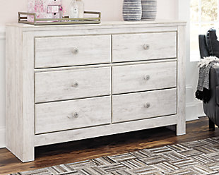 A one-of-a-kind girl deserves a bedroom retreat that celebrates her personal flair—and the Paxberry dresser is so befitting. Wowing with bohemian touches and a distressed whitewash finish, this dresser is rich with possibilities.Made of engineered wood (MDF/particleboard) | and decorative laminate | Whitewash replicated worn through paint with authentic touch | Hardware features a worn-through painted effect | 6 smooth-gliding drawers with faux laminate lining | Safety is a top priority, clothing storage units are designed to meet the most current standard for stability, ASTM F 2057 (ASTM International) | Drawers extend out to accommodate maximum access to drawer interior while maintaining safety