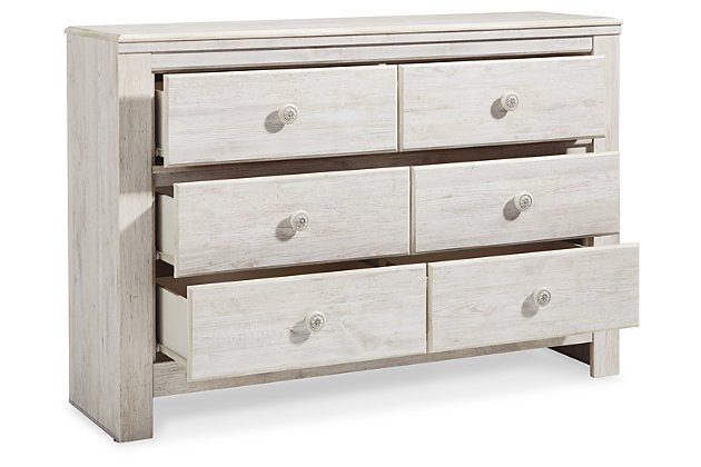 A one-of-a-kind girl deserves a bedroom retreat that celebrates her personal flair—and the Paxberry dresser is so befitting. Wowing with bohemian touches and a distressed whitewash finish, this dresser is rich with possibilities.Made of engineered wood and decorative laminate | Whitewash replicated worn through paint with authentic touch | Hardware features a worn-through painted effect | 6 smooth-gliding drawers with faux laminate lining | Safety is a top priority, clothing storage units are designed to meet the most current standard for stability, ASTM F 2057 (ASTM International) | Drawers extend out to accommodate maximum access to drawer interior while maintaining safety