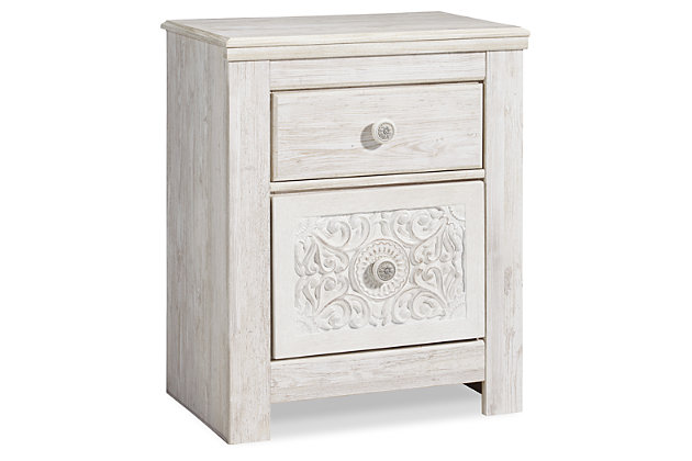 A one-of-a-kind girl deserves a bedroom retreat that celebrates her personal flair—and the Paxberry nightstand is so befitting. Wowing with artful, carved-effect detailing and richly distressed whitewash finish, this 2-drawer nightstand is a dream come true if you’re searching for something delightfully different. And with USB device charging, this nightstand is right up to speed with her high-tech lifestyle.Made of engineered wood (MDF/particleboard) and decorative laminate | Whitewash replicated worn through paint with authentic touch | 2 smooth-gliding drawers with faux laminate lining | 2 slim-profile USB charging ports | Power cord included; UL Listed | Minor assembly required