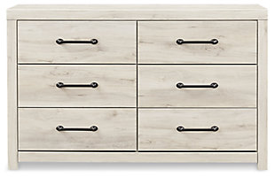 What a delightful take on rustic industrial style. Whether modern loft or modern farmhouse, the Cambeck dresser makes itself at home. The wispy whitewash palette enhances without covering the grain for that weathered look you crave. Elongated drawer pulls elevate the aesthetic.Made of engineered wood (MDF/particleboard) | and decorative laminate | Wispy white finish over replicated oak grain with authentic touch | Large-scale hardware with dark finish | 6 smooth-gliding drawers with faux linen lining | Includes tipover restraint device | Safety is a top priority, clothing storage units are designed Made of engineered wood and decorative laminate | Wispy white finish over replicated oak grain with authentic touch | Dark-tone industrial hardware | 6 smooth-gliding drawers | Drawer interiors are lined with a faux linen laminate for a clean finished look | Safety is a top priority, clothing storage units are designed to meet the most current standard for stability, ASTM F 2057 (ASTM International) | Drawers extend out to accommodate maximum access to drawer interior while maintaining safety