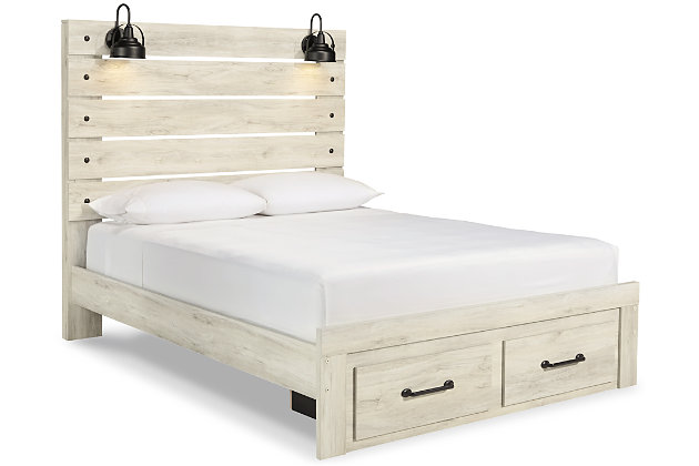 Whether you lean towards modern loft or modern farmhouse, the Cambeck panel storage bed and dresser tip the balance in your favor. The wispy whitewash finish enhances the style without covering the grain for that weathered look you just can’t get enough of. Love to read in bed? You’re sure to find the retro-chic light sconces and USB plug-ins on the open-slat style headboard to be a totally bright idea while the elongated metal drawer pulls really elevate the aesthetic. What a delightful take on rustic industrial style.Includes panel bed with storage (headboard, storage footboard and rails) and dresser  | Made of engineered wood (MDF/particleboard) and decorative laminate | Wispy white finish over replicated oak grain with authentic touch | Dresser with smooth-gliding drawers with faux linen lining; large-scale hardware with dark finish | Headboard with 2 decorative LED sconces (requires 3AA batteries each) and 2 slim-profile USB charging stations | Footboard with 2 smooth-gliding storage drawers | Power cord included; UL Listed | Foundation/box spring required, sold separately; mattress available, sold separately | Safety is a top priority, clothing storage units are designed to meet the most current standard for stability, ASTM F 2057 (ASTM International) | Drawers extend out to accommodate maximum access to drawer interior while maintaining safety | Assembly required | Estimated Assembly Time: 10 Minutes