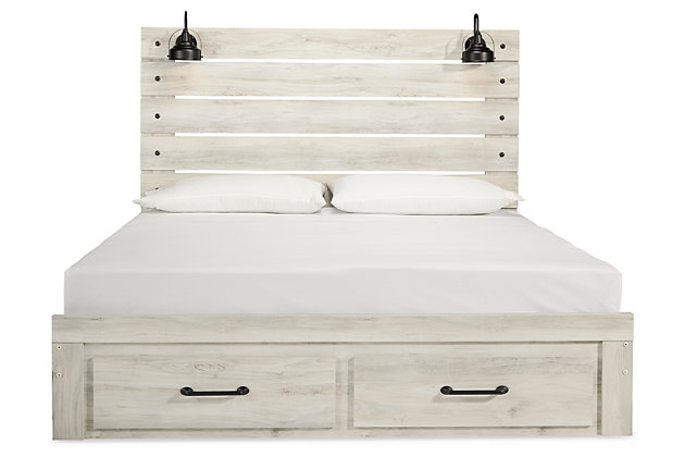 What a delightful take on rustic industrial style. Whether modern loft or modern farmhouse, the Cambeck queen panel bed makes itself at home. The wispy whitewash palette enhances without covering the grain for that weathered look you crave. Love to read in bed? You’re sure to find the retro-chic light sconces and USB plug-ins on the open-slat style headboard such a bright idea.Includes headboard, footboard and rails | Includes 2 footboard drawers | Made of engineered wood (MDF/particleboard) and decorative laminate | Wispy white finish over replicated oak grain with authentic touch | 2 decorative sconce lights, LED with 3 AA batteries | 2 slim-profile USB charging ports | Power cord included; UL-listed | Foundation/box spring required, sold separately | Mattress available, sold separately | Assembly required | Estimated Assembly Time: 10 Minutes