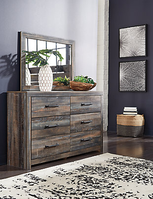 When merged in just the right way, rustic and industrial styles can make one happy marriage. Case in point: the Drystan dresser and mirror set. A refined take on barn board beauty, its complex, replicated wood grain showcases hints of burnt orange and teal tones for a sense of weatherworn authenticity. Elongated metal drawer pulls elevate the aesthetic.Made of engineered wood with replicated grain | 6 smooth-gliding drawers | Drawers lined with faux linen laminate for finished aesthetic | Dark-tone industrial hardware | Mirror attaches to back of dresser | Assembly required | Includes tipover restraint device