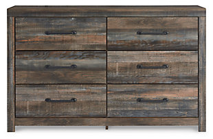 When merged in just the right way, rustic and industrial styles can make one happy marriage. Case in point: the Drystan dresser. A refined take on barn board beauty, its complex, replicated wood grain showcases hints of burnt orange and teal tones for a sense of weatherworn authenticity. Elongated drawer pulls elevate the aesthetic.Dresser only | Made of engineered wood and decorative laminate | Brown rustic finish with burnt orange and teal accents in a replicated wood grain with authentic touch | Dark-tone industrial hardware | 6 smooth-gliding drawers | Drawer interiors are lined with a faux linen laminate for a clean, finished look | Safety is a top priority, clothing storage units are designed to meet the most current standard for stability, ASTM F 2057 (ASTM International) | Drawers extend out to accommodate maximum access to drawer interior while maintaining safety
