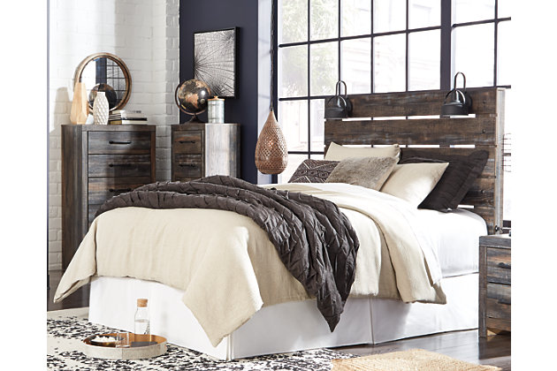 When merged in just the right way, rustic and industrial styles can make one happy marriage. Case in point: the Drystan queen panel headboard. A refined take on barn board beauty, its complex, replicated wood grain showcases hints of burnt orange and teal tones for a sense of weatherworn authenticity. Love to read in bed? You’re sure to find the pair of retro-chic light sconces and USB plug-ins on the open-slat style headboard such a bright idea.Headboard only | Hardware not included | Made of engineered wood and decorative laminate | Brown rustic finish with burnt orange and teal accents in a replicated wood grain with authentic touch | 2 decorative sconce lights, LED with 3 AA batteries | Dual USB charger | Power cord included; UL Listed | ¼" bolts are needed to attach headboard to existing bed frame | Bolt length depends on thickness of your bed frame | Assembly required