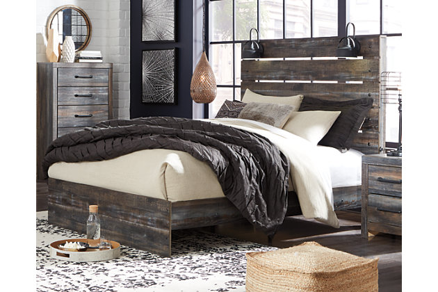 When merged in just the right way, rustic and industrial styles can make one happy marriage. Case in point: the Drystan panel bed. A refined take on barn board beauty, its complex, replicated wood grain showcases hints of burnt orange and teal tones for a sense of weatherworn authenticity. Love to read in bed? You’re sure to find the pair of retro-chic light sconces and USB plug-ins on the open-slat style headboard such a bright idea. Mattress and foundation/box spring available, sold separately.Includes headboard, footboard and rails | Made of egineered wood (MDF/particleboard) and decorative laminate | Brown rustic finish with burnt orange and teal accents in a replicated wood grain with authentic touch | 2 decorative sconce LED lights, each runs on 3AA batteries | 2 USB charging ports  | Power cord included; UL Listed | Foundation/box spring required, sold separately | Mattress available, sold separately | Assembly required | Estimated Assembly Time: 10 Minutes