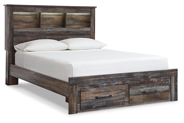 When merged in just the right way, rustic and industrial styles can make one happy marriage. Case in point: the Drystan queen bookcase bed with storage. A refined take on barn board beauty, its complex, replicated wood grain showcases hints of burnt orange and teal tones for a sense of weatherworn authenticity. Three open cubbies lined with a dimming LED light strip keep bedtime reads top of mind. Double drawers at the foot of the bed come in mighty handy.Includes bookcase headboard, footboard with storage and rails | Made of egineered wood (MDF/particleboard) and decorative laminate | Brown rustic finish with burnt orange and teal accents in a replicated wood grain with authentic touch | Headboard includes a dimming LED light | 2 smooth-gliding drawers in footboard | Small Space Solution | Foundation/box spring required, sold separately | Mattress available, sold separately | Assembly required | Estimated Assembly Time: 10 Minutes