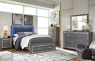 Reminiscent of Hollywood glamour of yesteryear, the Lodanna queen storage bed interprets luxury in a decidedly modern way. Sumptuous details include button-tufted upholstery, faceted faux crystals and chrome-tone accents beautifully lit by LED lights enhanced with remote-controlled settings for color and brightness.Includes headboard, footboard and side rails | Made of egineered wood (MDF/particleboard) and decorative laminate | Gray finish with replicated wood grain | Faux leather upholstery | Faux crystal and faceted chrome-tone metal accents | Accent LED lights with remote to control color and brightness | 2 smooth operating drawers | Power cord included; UL Listed | Small Space Solution | Foundation/box spring required, sold separately | Mattress available, sold separately | Assembly required | Estimated Assembly Time: 10 Minutes