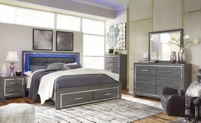 Lodanna King Panel Bed with 2 Storage Drawers with Mirrored Dresser and Chest, Gray