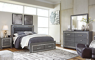 Reminiscent of Hollywood glamour of yesteryear, the Lodanna bedroom set with queen bed with storage, dresser/mirror and chest interprets luxury in a decidedly modern way. Headboard details include button-tufted upholstery, faceted faux crystals and LED lights enhanced with remote-controlled settings for color and brightness. Chrome-tone drawer pulls and accents are a chic complement to the dazzling gray finish.Includes panel bed (headboard, 2-drawer storage footboard and rails), 6-drawer dresser with mirror and 5-drawer chest | Made of engineered wood (MDF/particleboard) and decorative laminate | Gray finish with replicated wood grain | Dresser, chest and footboard with smooth-operating drawers; faceted chrome-tone pulls and accents | Bed with faux leather upholstery and faux crystal accents | Bed with accent LED lights with remote to control color and brightness | Power cord included; UL Listed | Mirror attaches to back of dresser | Foundation/box spring required, sold separately; mattress not included, sold separately | Safety is a top priority, clothing storage units are designed to meet the most current standard for stability, ASTM F 2057 (ASTM International) | Drawers extend out to accommodate maximum access to drawer interior while maintaining safety | Assembly required | Estimated Assembly Time: 15 Minutes