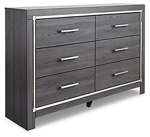 Reminiscent of Hollywood glamour of yesteryear, the Lodanna dresser interprets luxury in a decidedly modern way. Dazzling gray finish and faceted chrome-tone accents enhance the star power, while six smooth-gliding drawers provide enough storage to appease your inner diva.Dresser only | Made of engineered wood (MDF/particleboard) and decorative laminate | Gray finish with replicated wood grain | Faceted chrome-tone pulls and accents | 6 smooth-operating drawers | Drawers lined with faux linen laminate | Safety is a top priority, clothing storage units are designed to meet the most current standard for stability, ASTM F 2057 (ASTM International) | Drawers extend out to accommodate maximum access to drawer interior while maintaining safety