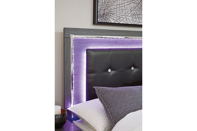 Reminiscent of Hollywood glamour of yesteryear, the Lodanna panel bed interprets luxury in a decidedly modern way. Sumptuous details include button-tufted upholstery, faceted faux crystals and chrome-tone accents beautiy lit by LED lights enhanced with remote-controlled settings for color and brightness.Includes headboard, footboard and side rails | Made of egineered wood (MDF/particleboard) and decorative laminate | Gray finish with replicated wood grain | Faux leather upholstery | Faux crystal and faceted chrome-tone metal accents | Accent LED lights with remote to control color and brightness | Power cord included; UL Listed | Foundation/box spring required, sold separately | Mattress available, sold separately | Assembly required | Estimated Assembly Time: 10 Minutes