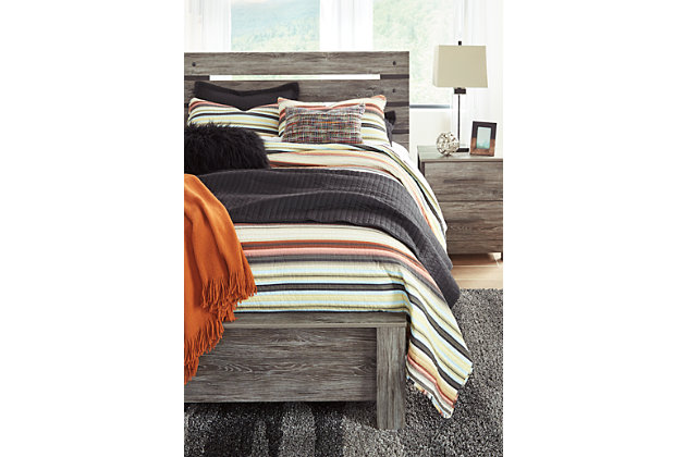 As much as you love escaping to the country, you’re equally drawn to the city. No wonder the Cazenfeld queen panel headboard fits you so well. Sporting an easy-on-the-eyes finish inspired by weathered barn wood, Cazenfeld is sure to please with an uptown look and a down-to-earth sensibility. Open slat headboard with rivet accents gives the urban pastoral aesthetic an added punch of character.Headboard only | Hardware not included | Made of engineered wood (MDF/particleboard) and decorative laminate | Rustic warm gray finish over replicated oak grain | ¼" bolts are needed to attach headboard to existing bed frame | Bolt length depends on thickness of your bed frame | Assembly required