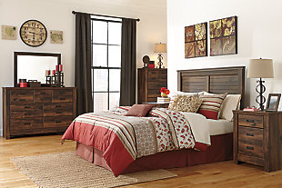 If there’s any room in your home where you want an easy-breezy vibe and relaxed sensibility, it’s the bedroom. Bathed in a rich, dark and wonderfully “weathered” finish, the Quinden queen panel headboard has horizontal slat details resembling louvered panels. How beautifully it captures that rustic cottage feel, but with clean-lined refinement.Headboard only | Made of engineered wood (MDF/particleboard) and decorative laminate | Warm dark brown vintage finish over replicated oak grain and authentic touch | ¼” bolts (not included) are needed to attach headboard to existing bed frame | Bolt (not included) length depends on the thickness of your bed frame | Assembly required