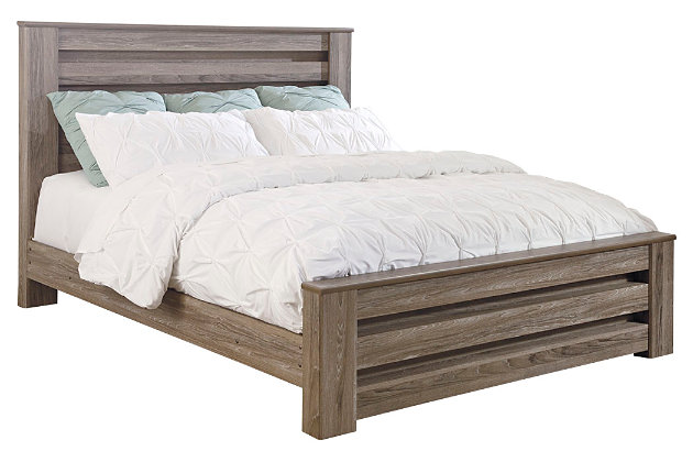 Urban sophistication with a decidedly relaxed air. If effortless elegance is the impression you’re going for, the Zelen queen panel bed is custom made to fit your space. It’s got the crisp, clean lines of a contemporary piece, but with softly weathered elements, including an earthy gray finish that lets the beauty of replicated oak grain flow through. Mattress and foundation/box spring sold separately.Includes headboard, footboard and rails | Made of engineered wood (MDF/particleboard) and decorative laminate | Warm gray vintage finish with white wax effect over replicated oak grain | Foundation/box spring required, sold separately | Mattress available, sold separately | Assembly required | Estimated Assembly Time: 10 Minutes