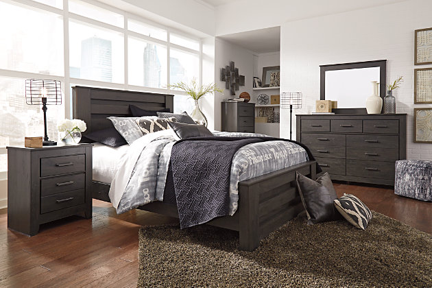 Priced to entice and styled to impress, the alluring Brinxton queen panel bed is urban sophistication with a decidedly relaxed air. It’s got the crisp, clean lines of a contemporary piece, but with an earthy element. Deep, horizontal grooves infuse depth and dimension, a replicated oak grain effect gives the charcoal gray finish warmth and character. Mattress and foundation/box spring sold separately.Includes headboard, footboard and rails | Made of engineered wood and decorative laminate | Dark charcoal finish over replicated oak grain | Foundation/box spring required, sold separately | Mattress available, sold separately | Assembly required | Estimated Assembly Time: 10 Minutes