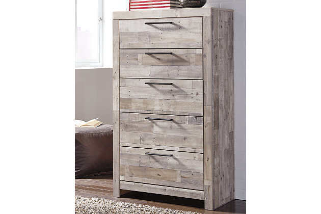 Butcher block has long been a staple in the kitchen, but the Effie chest of drawers beautifully transforms it into something new in the bedroom. Nicks and gouges give each piece the one-of-a-kind look and feel of reclaimed wood lending an urban farmhouse aesthetic at a comfortably affordable price. When space is an issue, you don’t have to long for style—five roomy drawers beautifully accommodate.Made of engineered wood and decorative laminate | Butcher block, whitewash finish over replicated pine grain with authentic touch | Drawer pulls in antiqued gunmetal finish | 5 smooth operating drawers with faux linen lining | Safety is a top priority, clothing storage units are designed to meet the most current standard for stability, ASTM F 2057 (ASTM International) | Drawers extend out to accommodate maximum access to drawer interior while maintaining safety | Assembly required