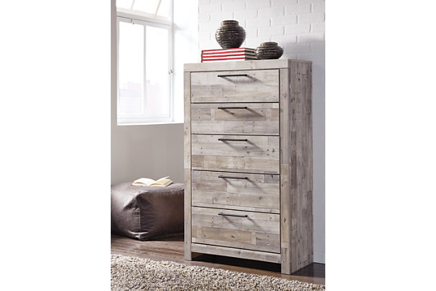 Butcher block has long been a staple in the kitchen, but the Effie chest of drawers beautifully transforms it into something new in the bedroom. Nicks and gouges give each piece the one-of-a-kind look and feel of reclaimed wood lending an urban farmhouse aesthetic at a comfortably affordable price. When space is an issue, you don’t have to long for style—five roomy drawers beautifully accommodate.Made of engineered wood and decorative laminate | Butcher block, whitewash finish over replicated pine grain with authentic touch | Drawer pulls in antiqued gunmetal finish | 5 smooth operating drawers with faux linen lining | Safety is a top priority, clothing storage units are designed to meet the most current standard for stability, ASTM F 2057 (ASTM International) | Drawers extend out to accommodate maximum access to drawer interior while maintaining safety | Assembly required