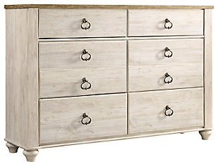The Willowton dresser is the ultimate statement piece for a coastal cottage or shabby chic inspired retreat. Whitewashed finish on the drawers and sides is wonderfully easy on the eyes. Paired with the unique plank-effect top, it’s a driftwoody look that has our minds drifting away to beachy-keen escapes.Dresser only | Made of engineered wood (MDF/particleboard) and decorative laminate | Whitewash replicated worn through paint with authentic touch | Replicated wood grained block pattern with authentic touch | Antiqued brass-tone ring-pull hardware | 6 smooth-gliding drawers | Safety is a top priority, clothing storage units are designed to meet the most current standard for stability, ASTM F 2057 (ASTM International) | Drawers extend out to accommodate maximum access to drawer interior while maintaining safety | Assembly required