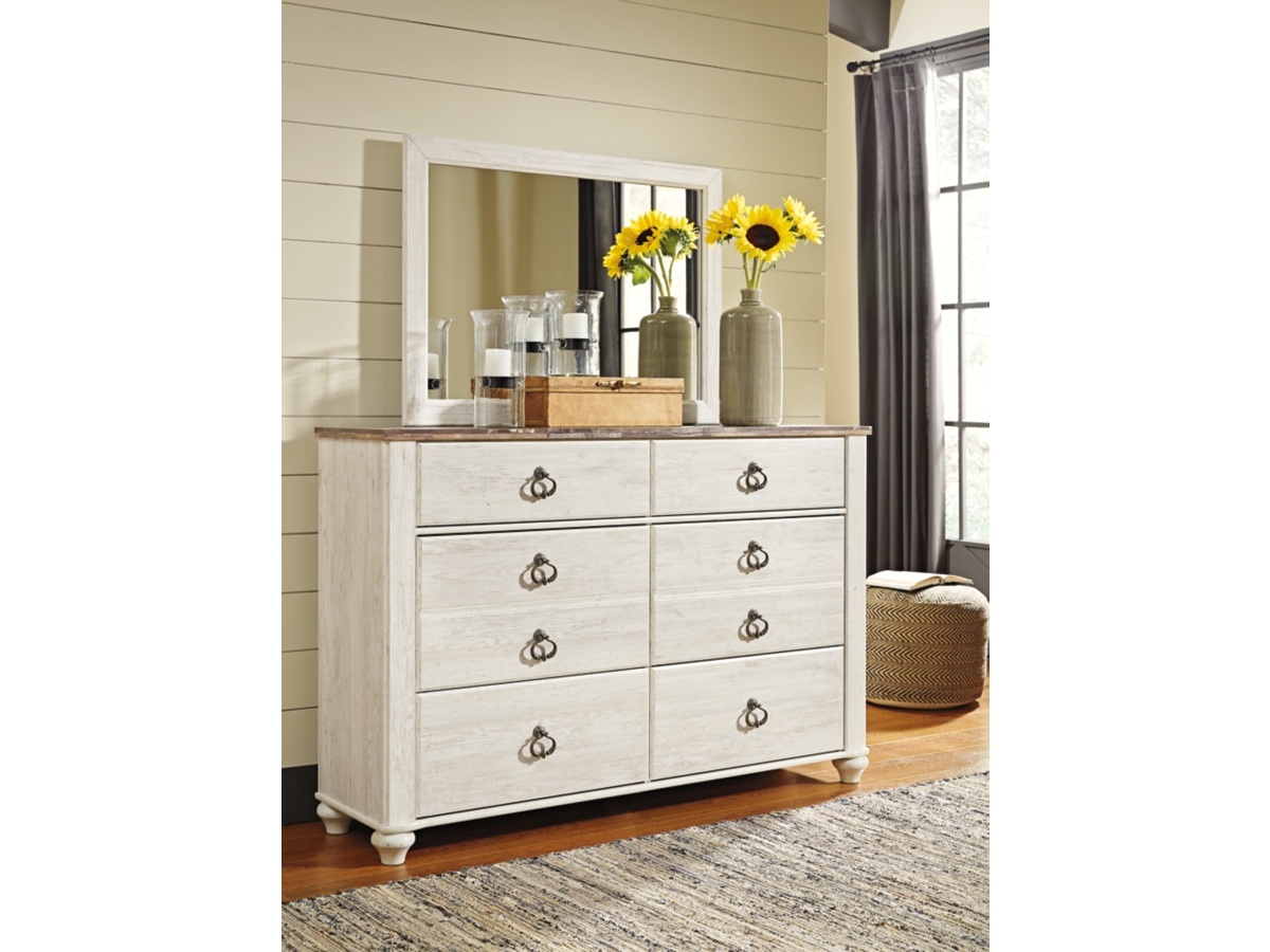 The Willowton Brown / Beige / White Six Drawer Dresser is available at  Discount Furniture Center proudly serving South Hill and Farmville, VA and  surrounding areas!